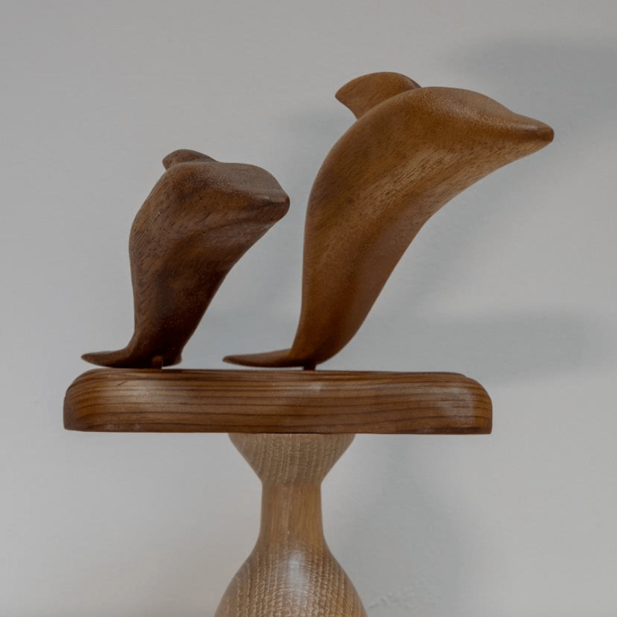 Carving Dolphin on Seascape